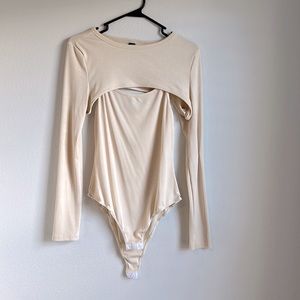 Cream body suit with sleeved cover up